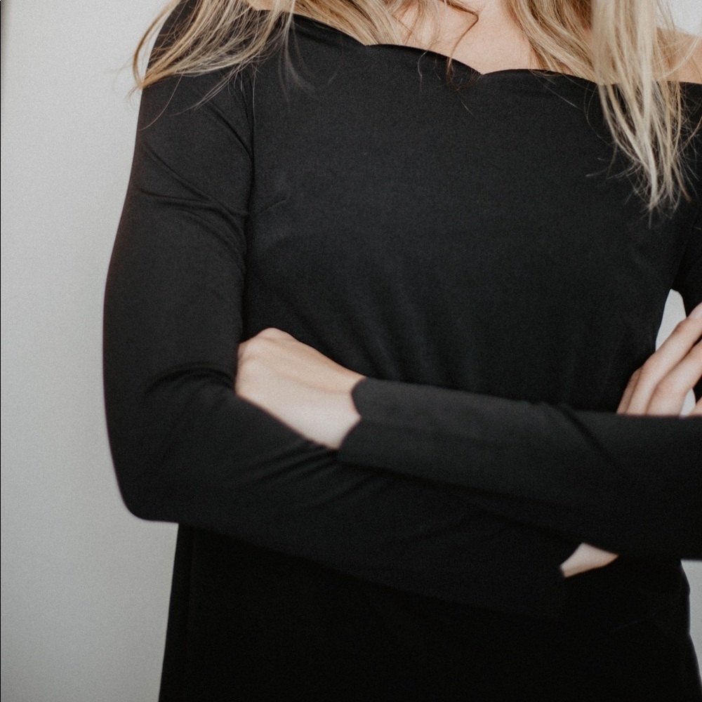 Scalloped black top